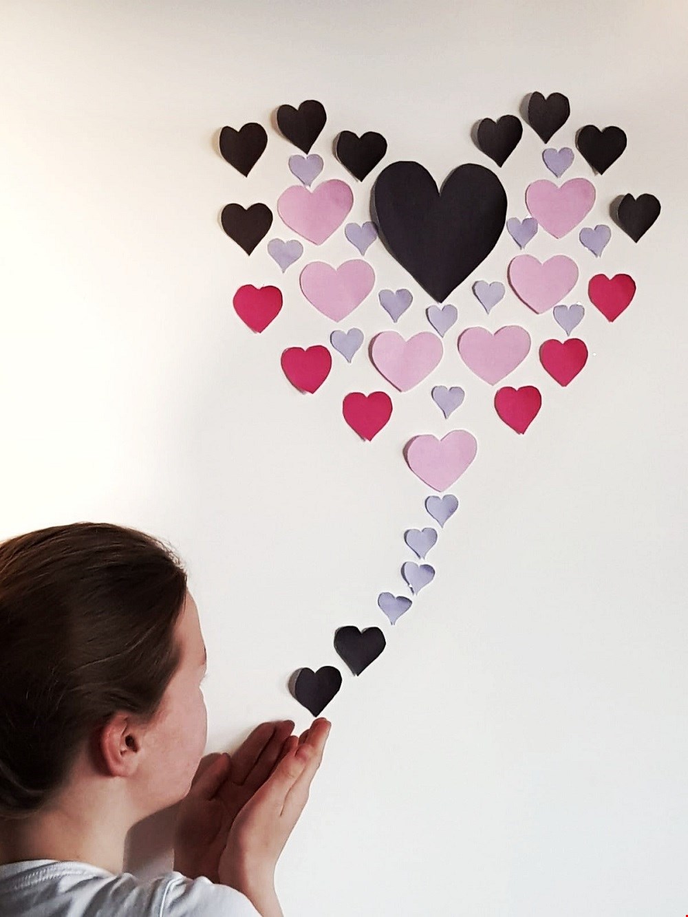 Plak de hartjes op de muur Plak de hartjes op de muur