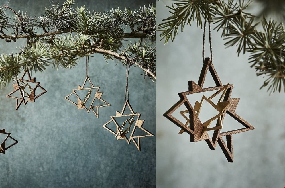 Prachtige ster van gerookt eikenhout en messing  Prachtige ster van gerookt eikenhout en messing