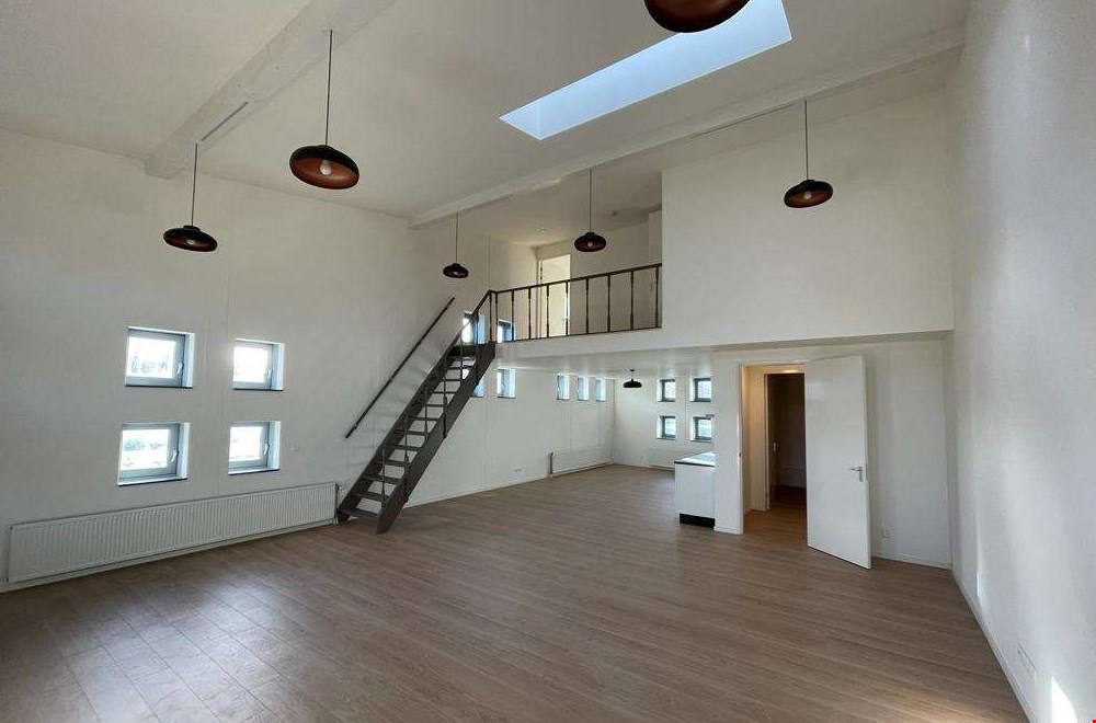 Wonen in een voormalig gemeentehuis Wonen in een voormalig gemeentehuis