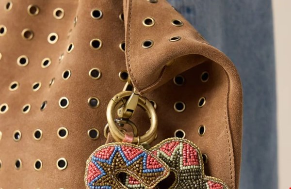 Suède tas met studs