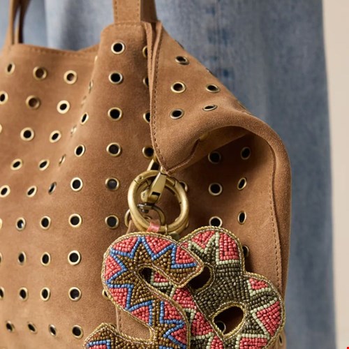 Suède tas met studs