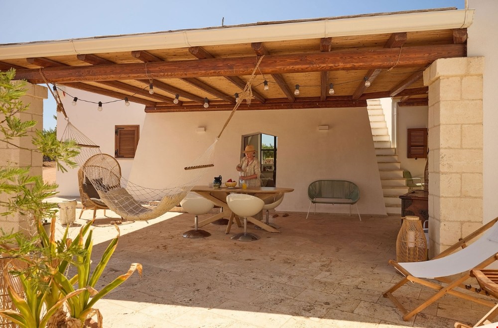 Stijlvol vakantiehuis van La Fuga Salento in Puglia, tussen olijfbomen en vlak bij zee.